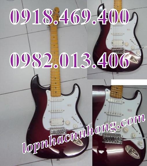 Đàn guitar điện màu đỏ đô