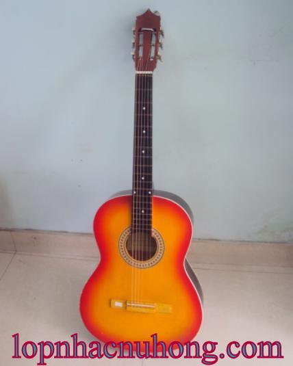 Đàn guitar màu vàng viền đỏ